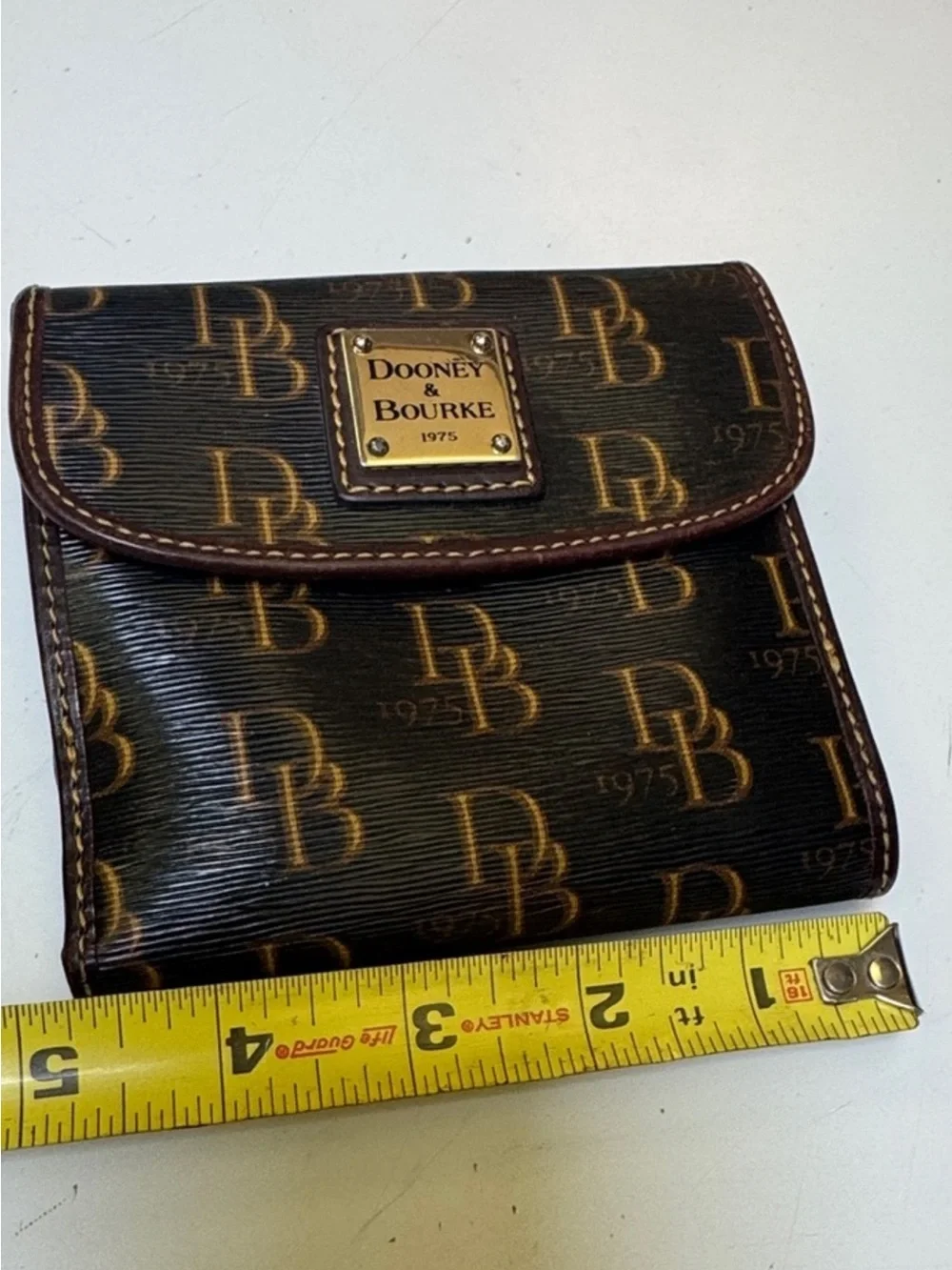 Dooney & Bourke Dark Brown Monogram Fold Wallet with Gold Logo Plate